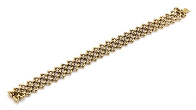 Lot 70 - An Edwardian two row hoop link bracelet