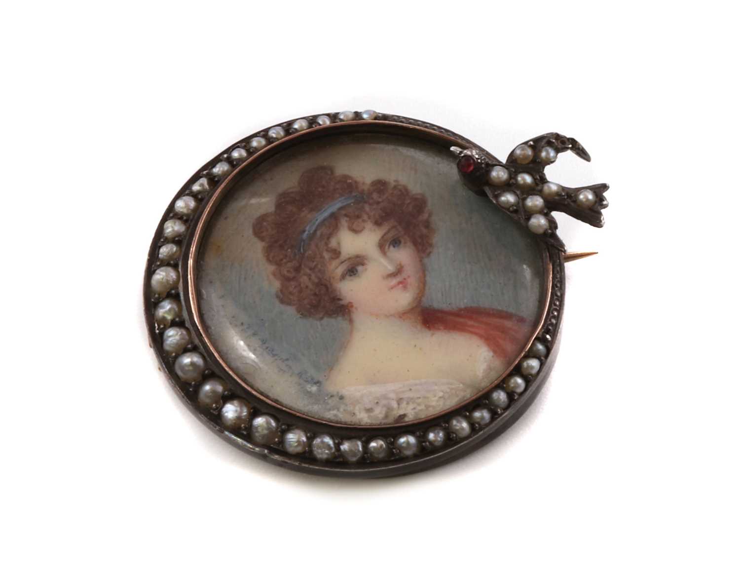 Lot 8 - A silver mounted portrait miniature brooch