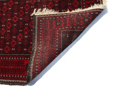 Lot 209 - A Baluch tribal wool rug