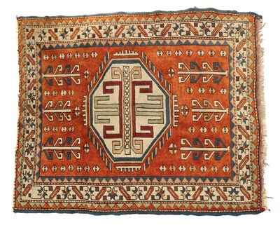Lot 203 - A tribal wool rug