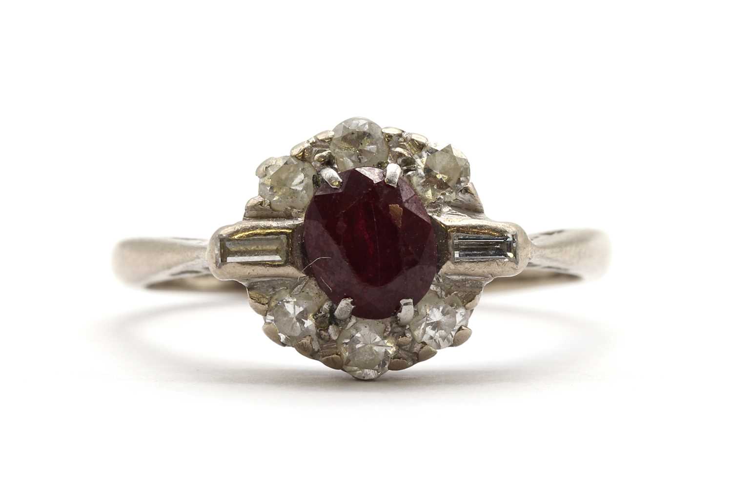 Lot 129 - A white gold ruby and diamond cluster ring