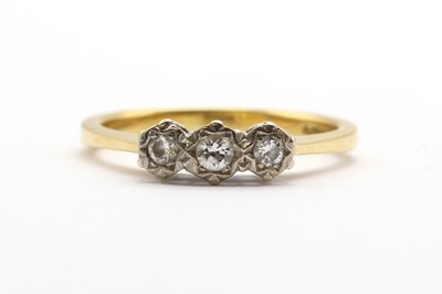 Lot 95 - An 18ct gold three stone diamond ring