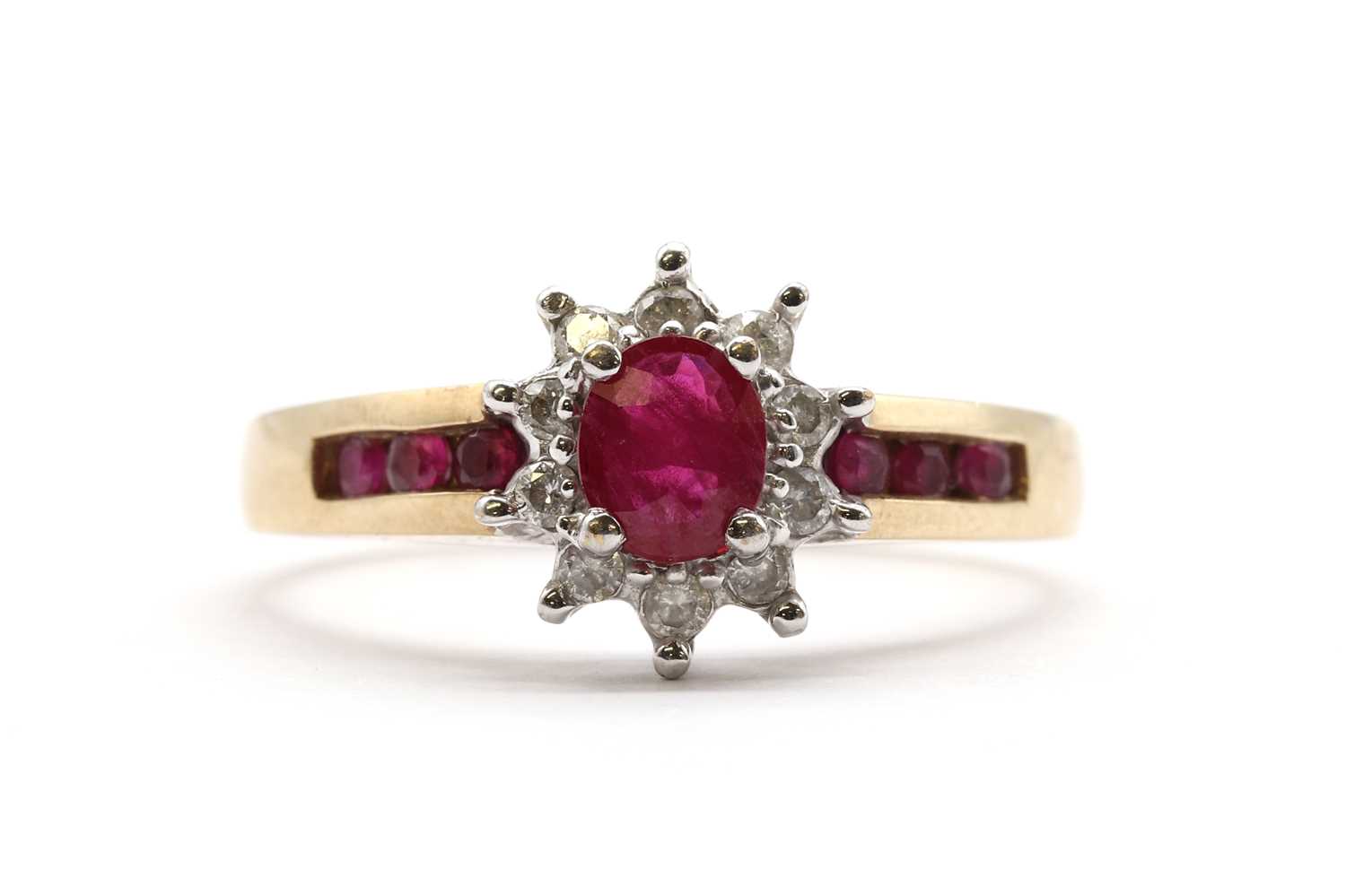 Lot 130 - A 9ct gold ruby and diamond cluster ring