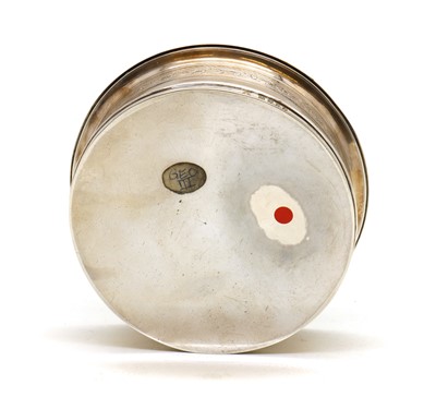 Lot 49 - A George III style silver wine coaster