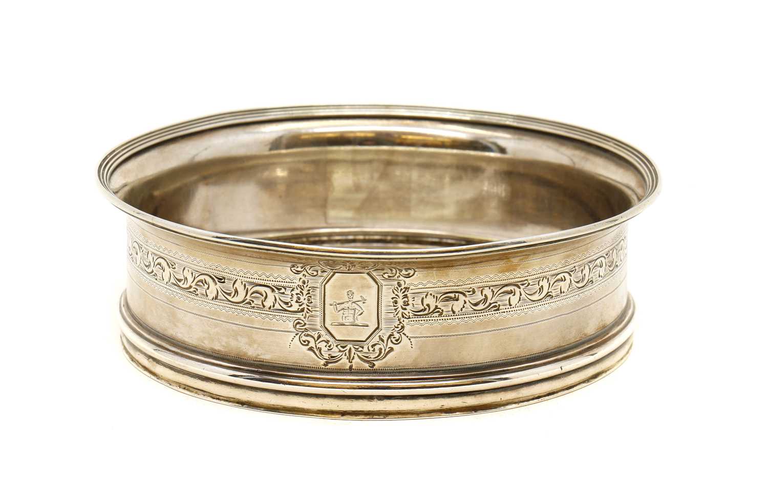 Lot 49 - A George III style silver wine coaster