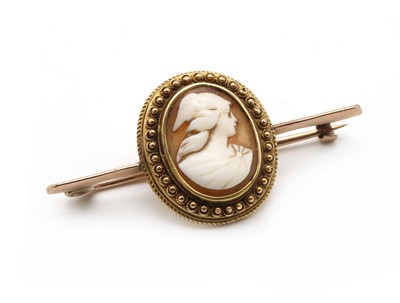 Lot 36 - A gold mounted shell cameo brooch