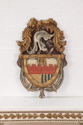 Lot 278 - A painted and parcel-gilt limewood coat of arms