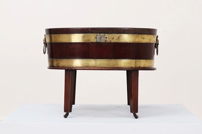 Lot 245 - A George III mahogany and brass wine cooler