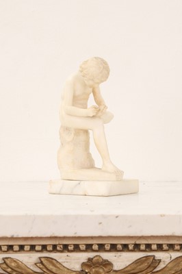 Lot 193 - A small grand tour alabaster figure of Spinario