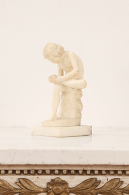 Lot 193 - A small grand tour alabaster figure of Spinario