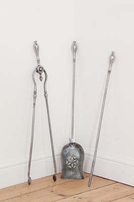 Lot 221 - A set of three George III polished steel fire tools