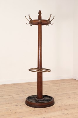 Lot 587 - An oak and brass hat and umbrella stand
