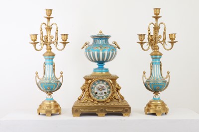 Lot 163 - A gilt-bronze and Sèvres-style porcelain clock garniture