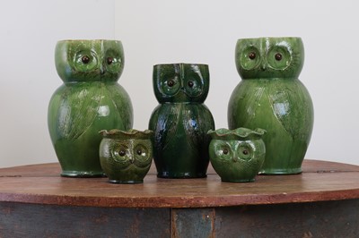 Lot 247 - A pair of large green-glazed stoneware owl-form ewers
