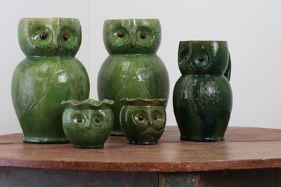 Lot 247 - A pair of large green-glazed stoneware owl-form ewers