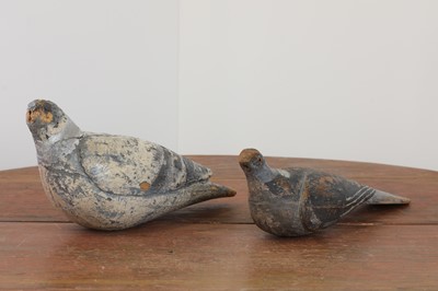 Lot 186 - Two carved and painted pine decoy pigeons