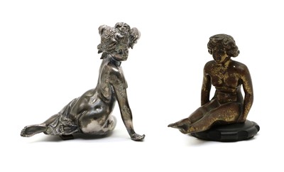 Lot 143 - A silvered spelter figure of a seated nude female