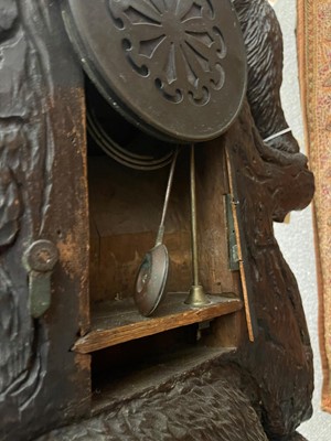 Lot 255 - A large floor-standing Black Forest clock