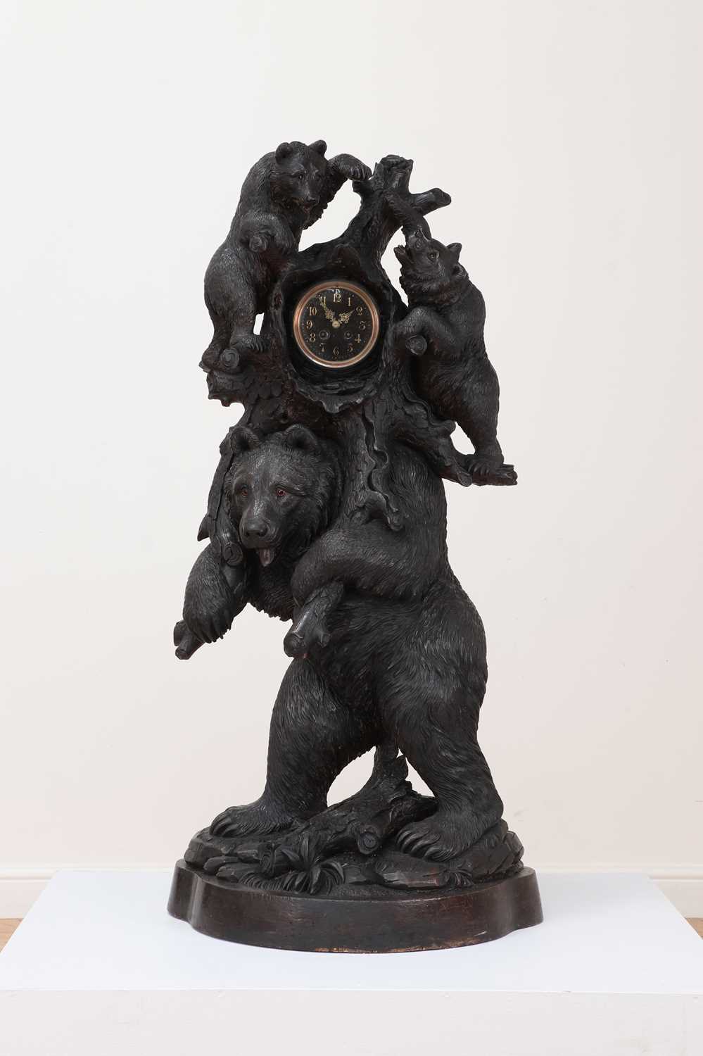 Lot 255 - A large floor-standing Black Forest clock