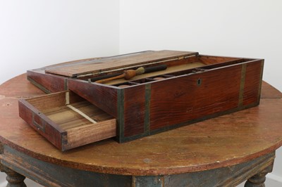 Lot 493 - A padouk and brass-bound writing box