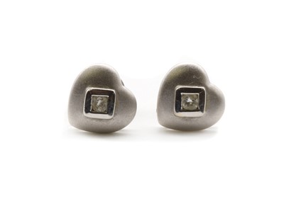 Lot 148 - A pair of 18ct white gold diamond set heart earrings