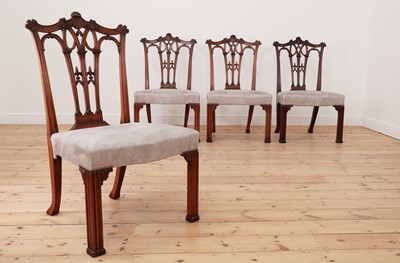 Lot 620 - A set of nine George III-style mahogany dining chairs