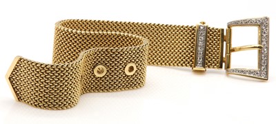 Lot 226 - A two colour gold diamond set jarretière bracelet, by Carl Bucherer