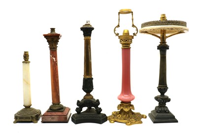 Lot 153 - A group of five column table lamps