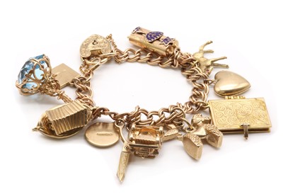 Lot 289 - A gold charm bracelet