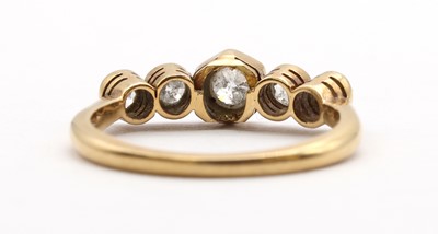 Lot 96 - A gold five stone diamond ring