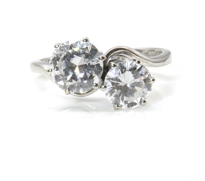 Lot 220 - An 18ct white gold two stone diamond crossover ring