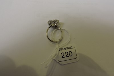 Lot 220 - An 18ct white gold two stone diamond crossover ring