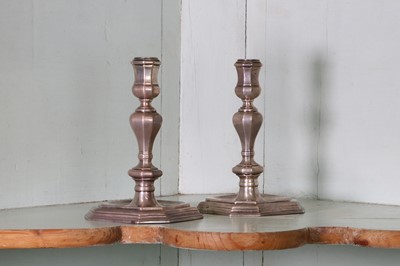 Lot 335 - A pair of early 18th century Britannia silver candlesticks