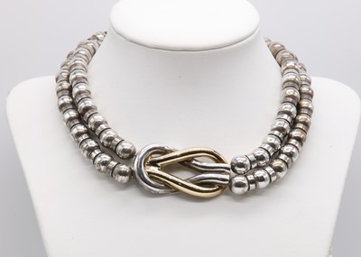 Lot 236 - A Greek silver and gold two row bead necklace, by Zolotas