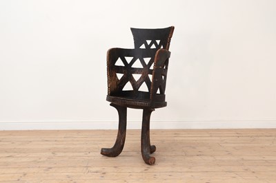 Lot 57 - A carved wooden chair