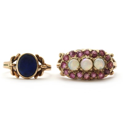 Lot 250 - A gold opal and ruby landscape cluster ring