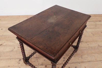 Lot 258 - A James II oak side table