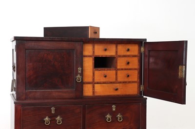 Lot 262 - A George III mahogany cabinet on stand