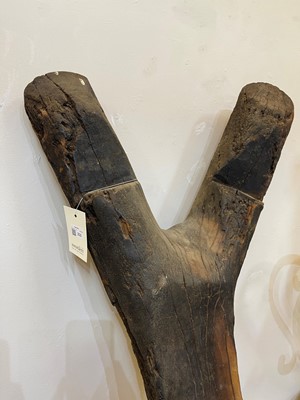 Lot 233 - A carved wooden granary ladder