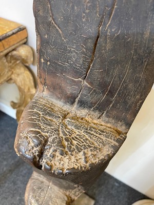 Lot 233 - A carved wooden granary ladder