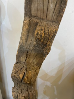 Lot 231 - A carved wooden granary ladder