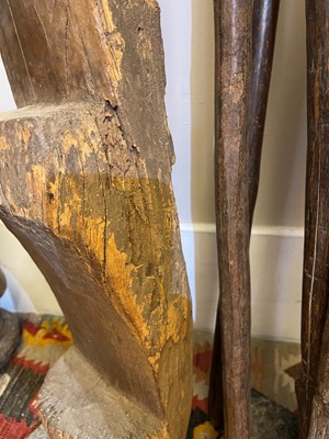 Lot 234 - A carved wooden granary ladder