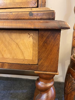 Lot 264 - A William and Mary walnut and feather band chest on stand