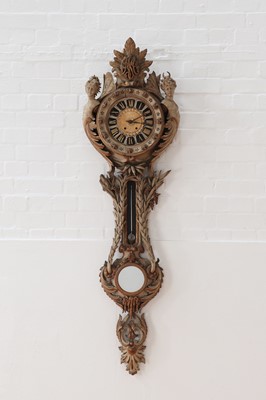 Lot 15 - A Continental carved and painted softwood wall clock