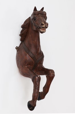 Lot 601 - A carved and painted pine horse