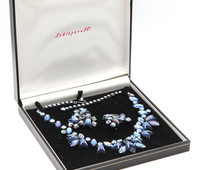 Lot 243 - A 'blue tulip' paste necklace and earrings suite, by Elsa Schiaparelli, c.1948