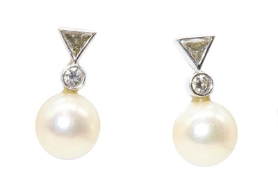 Lot 249 - A pair of Continental diamond and cultured pearl drop earrings