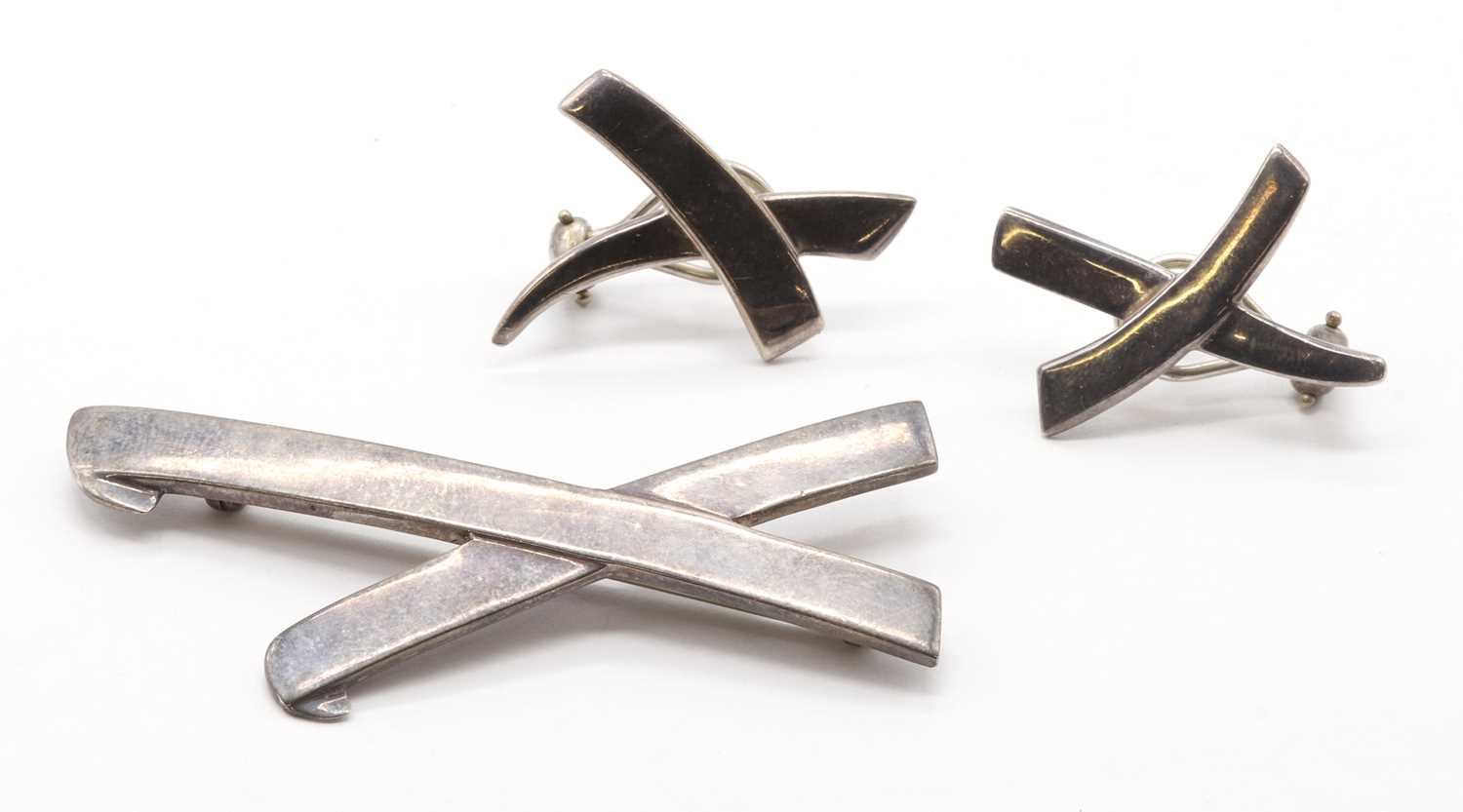 Lot 129 - A silver 'Graffiti X' earring and brooch/pendant suite, by Tiffany & Co.