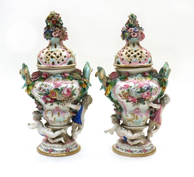 Lot 194 - A near pair of Meissen pot pourri vases and covers