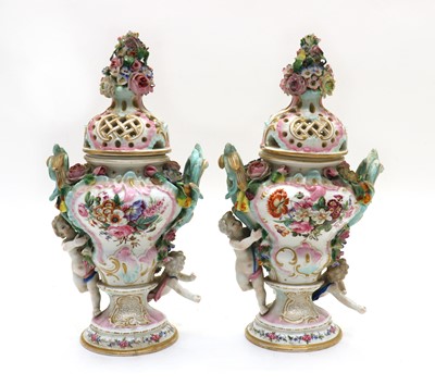 Lot 194 - A near pair of Meissen pot pourri vases and covers